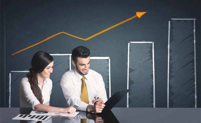 Business People Reviewing Charts